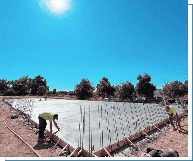 A group of people working on the ground.